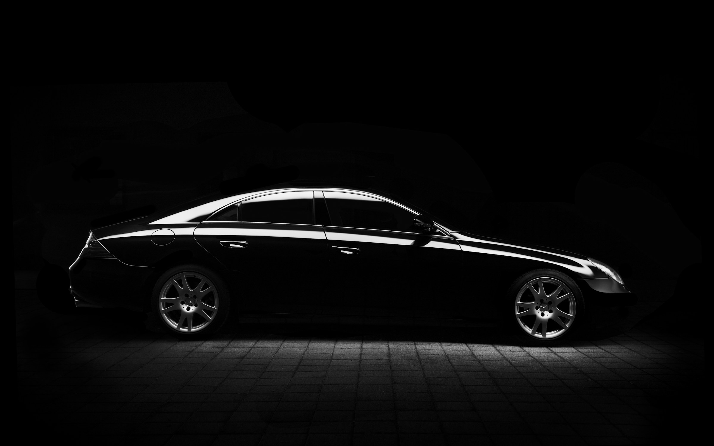Chauffeur-driven luxury sedan